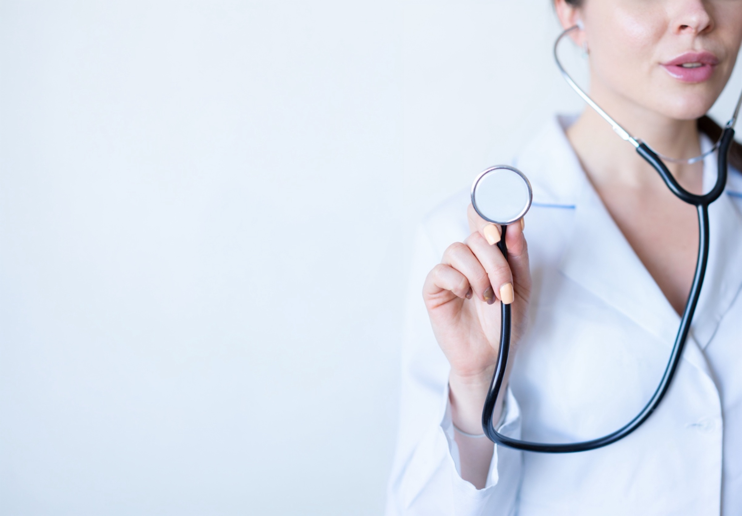 A primary care physician with a patient in a relaxed, modern practice